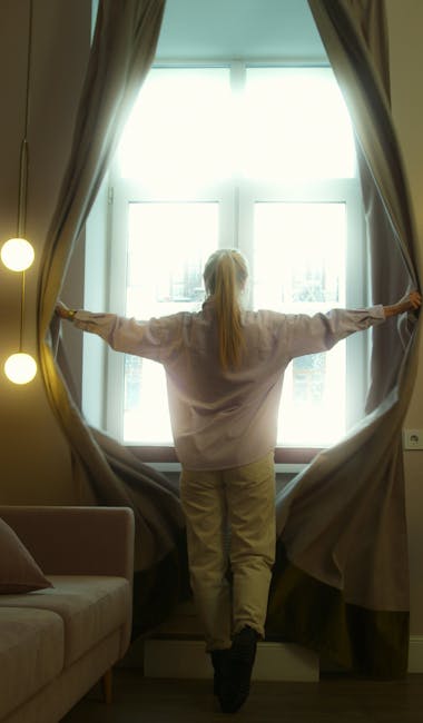 Sun shining through a window onto a person starting their morning yoga routine.